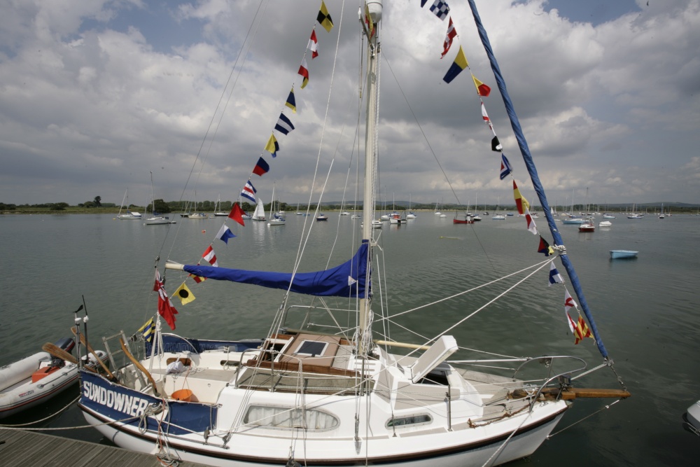 Small Harbour and boats with bunting..