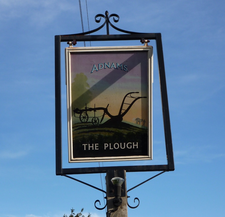 Photograph of The Plough Inn sign