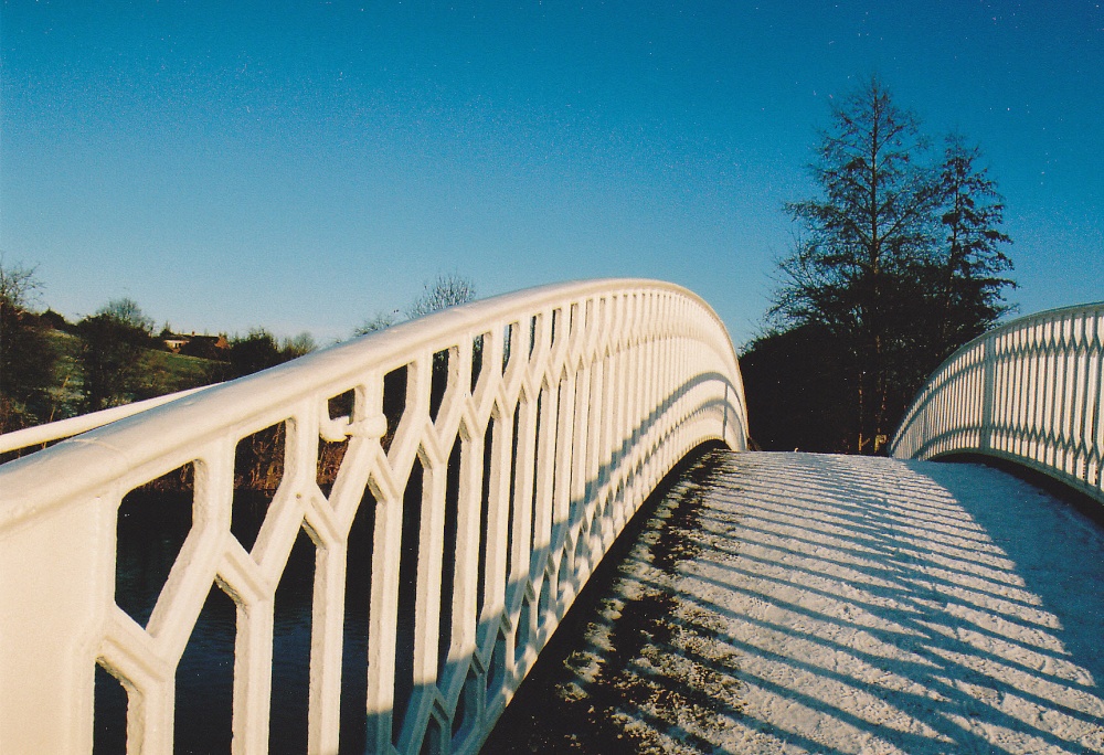 Snowy bridge over Canal