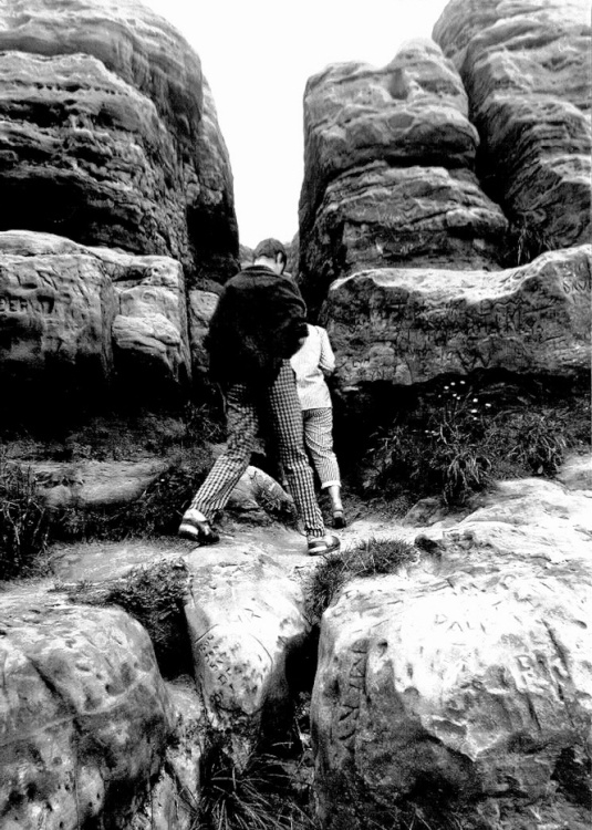 Climbing the rocks under the Castle.