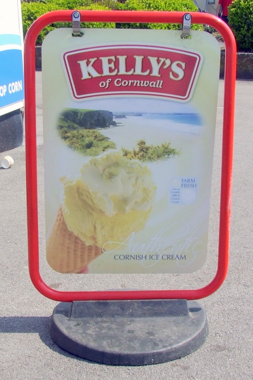 Kelly's Ice Cream Sign On The Sea Front