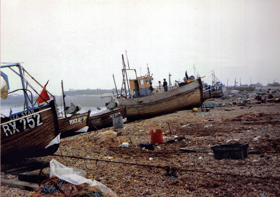 Fishing boats on a misty day.