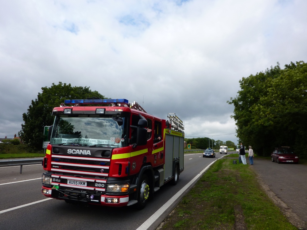 A fire engine which ended the long row of truckers