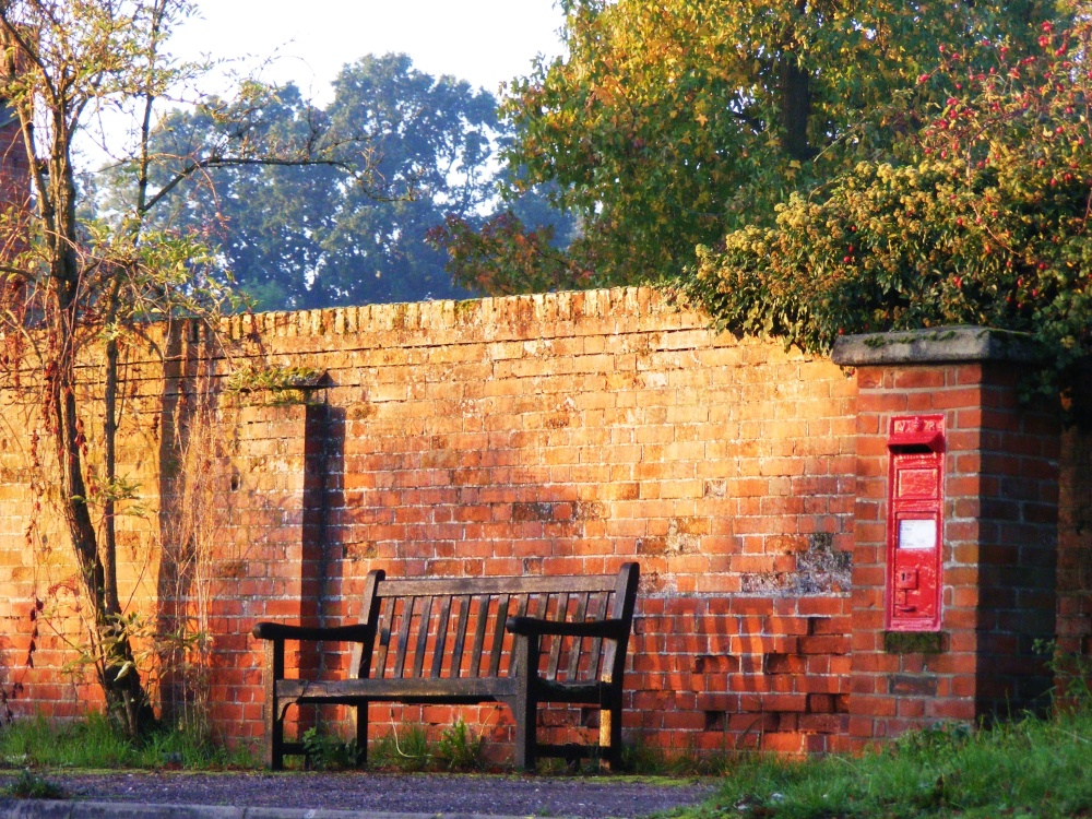 Bench, letter box, dawn.