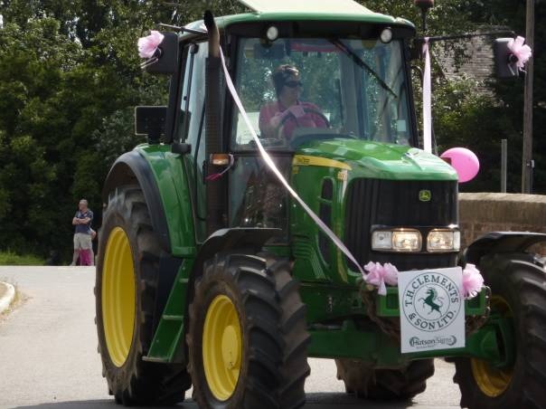 Tractor girls breast cancer fund raiser