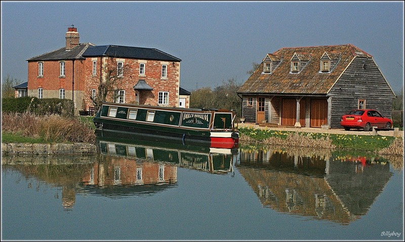 Photograph of House and Boat