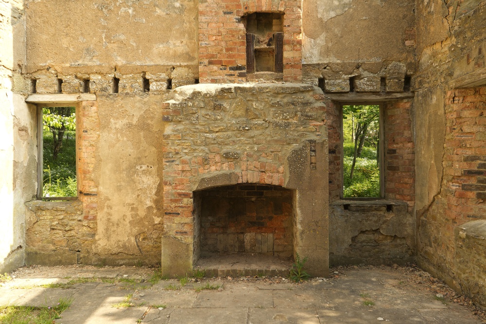 Fireplaces in one of the abandoned cottages at Tyneham