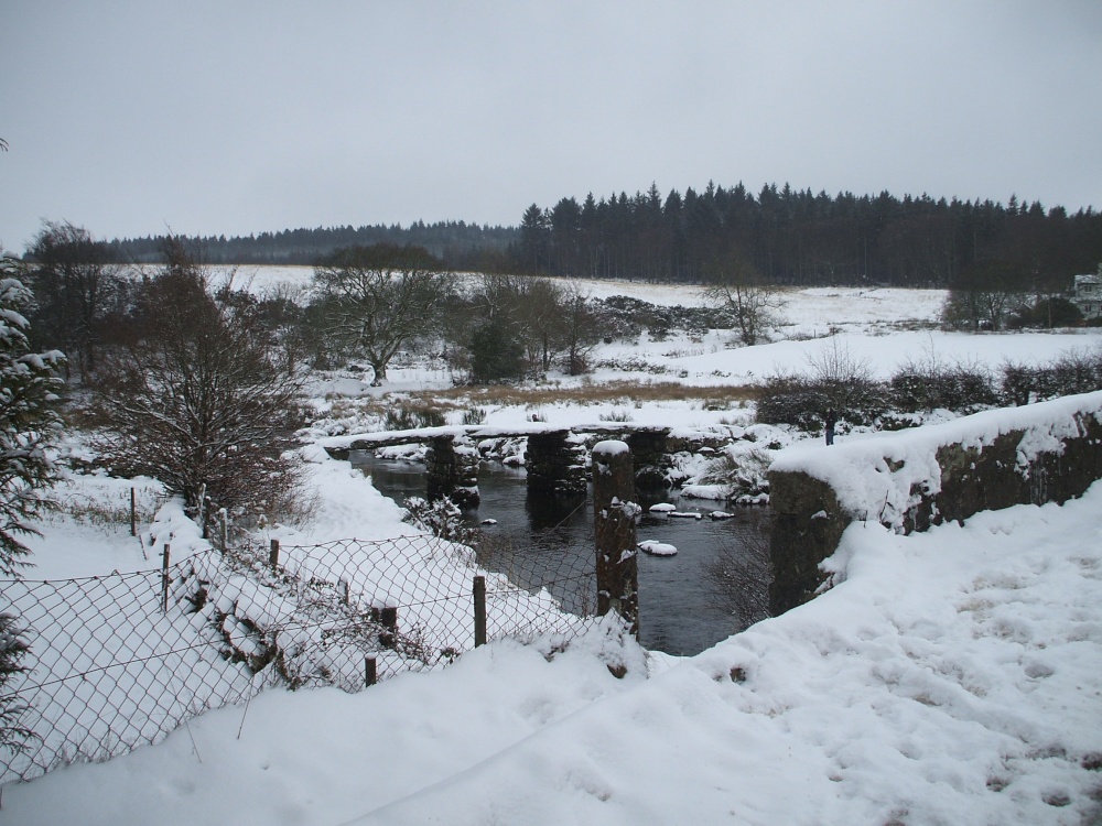 Clapper bridge near Postbridge, in Winter.