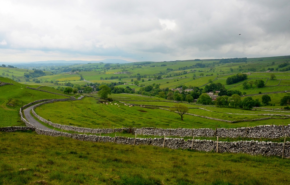 Malham Rakes in June, looking down Malhamdale towards the village of Malham, Yorkshire