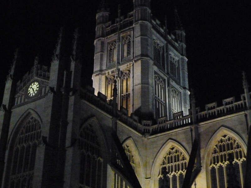 Photograph of Bath Abbey illuminated at night