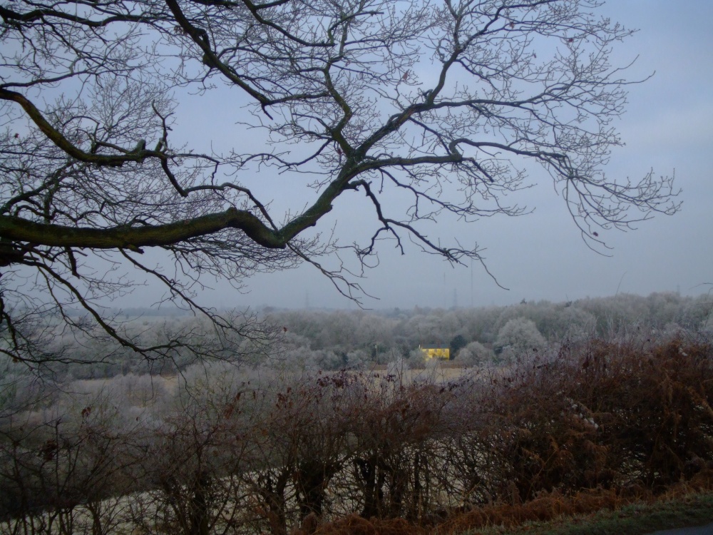 A cold winters day with a sunshine house