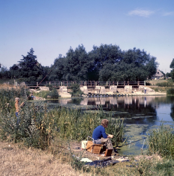 Fishermen at Throop Mill millpond, near Bournemouth