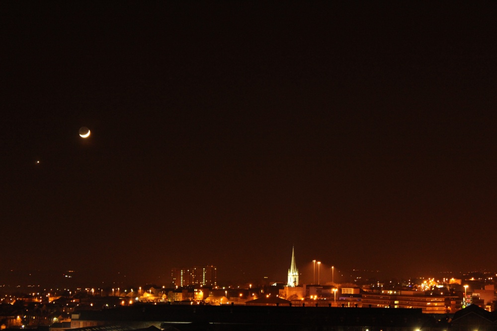 Photograph of Dudley at night, moon and venus