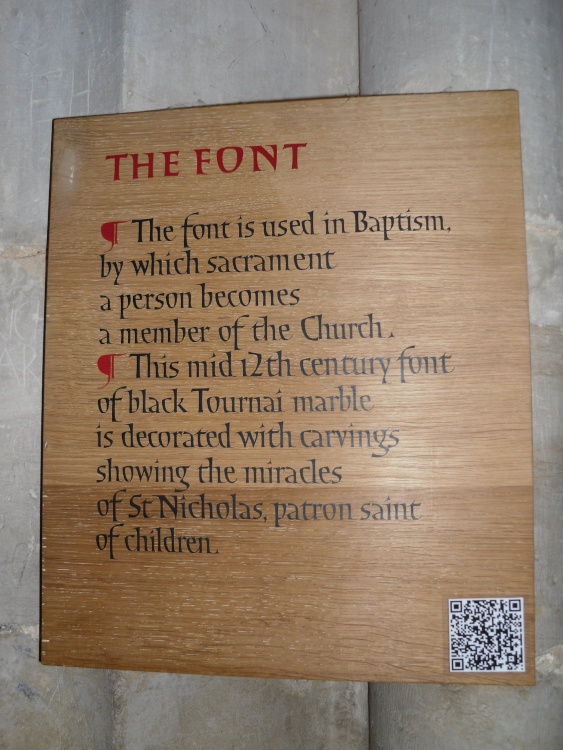 Winchester, in the Cathedral. Plaque near the font