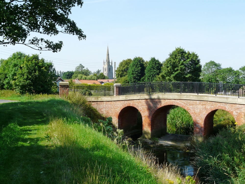 Photograph of Red bridge from the beckside