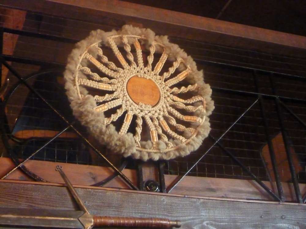 Photograph of A wheel made of wool at St Olaves Priory