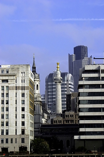 Monument surrounded by Tower Blocks