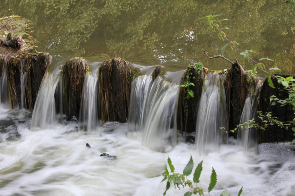 Photograph of And the river flows on