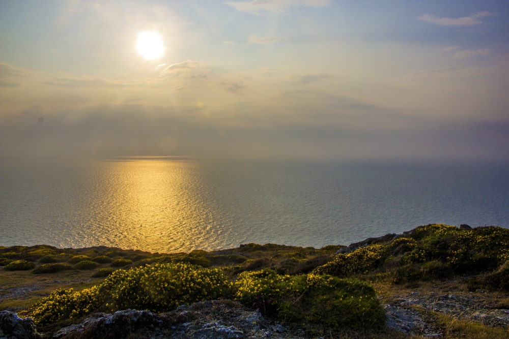 Setting sun over the sea from Mynydd Mawr near Aberdaron