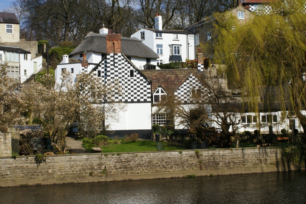 Historic house on the banks of the River Nidd. photo by David Walter