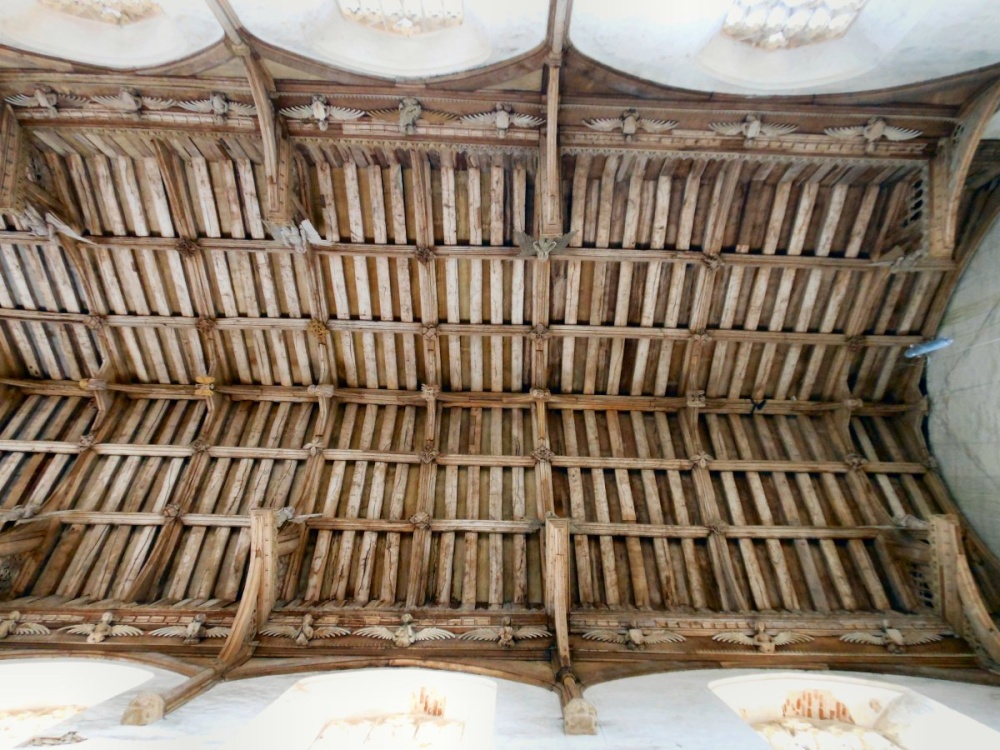 Painted fine hammer beam roof decorated with carved angels, Cawston