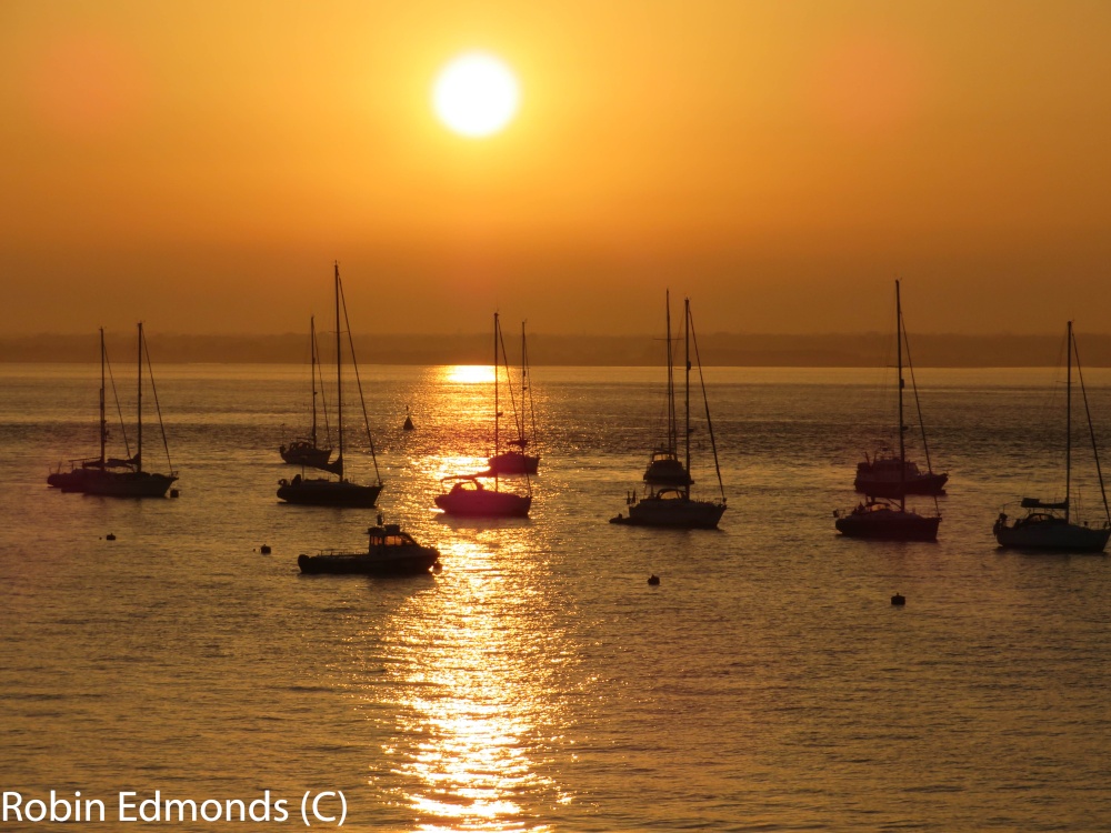 Photograph of Boats in the setting sun at Yarmouth, Isle of Wight