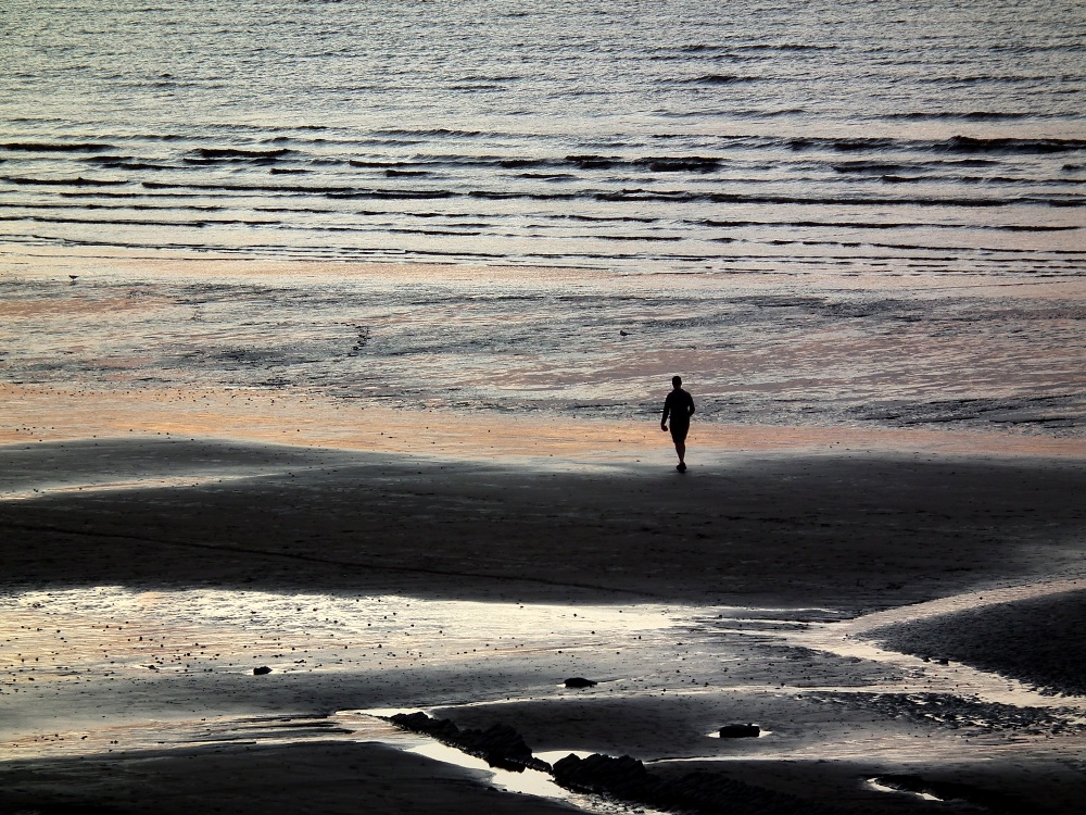 Photograph of Tide out, sun setting