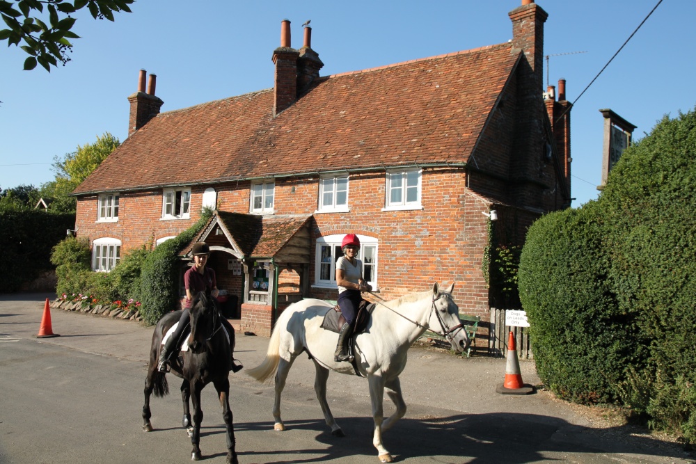 Riders outside The Bell Inn, Aldworth
