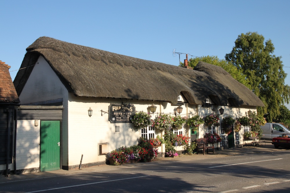 The pretty thatched Four Points Inn, Aldworth