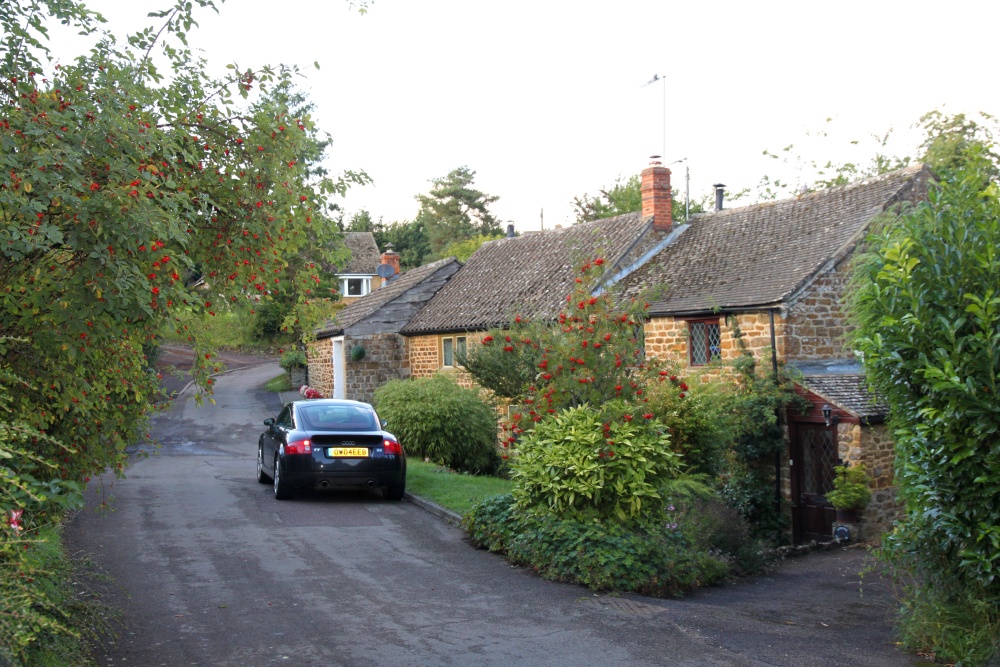 Photograph of Period cottages and Autumn berries in Back Lane, Epwell
