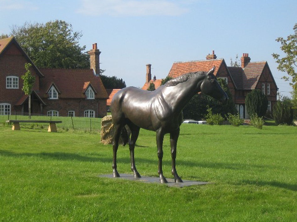 Photograph of Statue of Best Mate, three times winner of the Cheltenham Gold Cup, standing in East Lockinge
