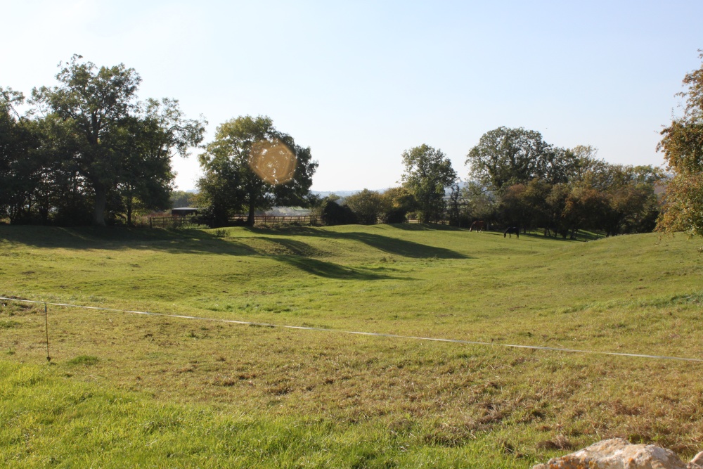 Photograph of Mounds in the grass which indicate the site of the old village of Churchill