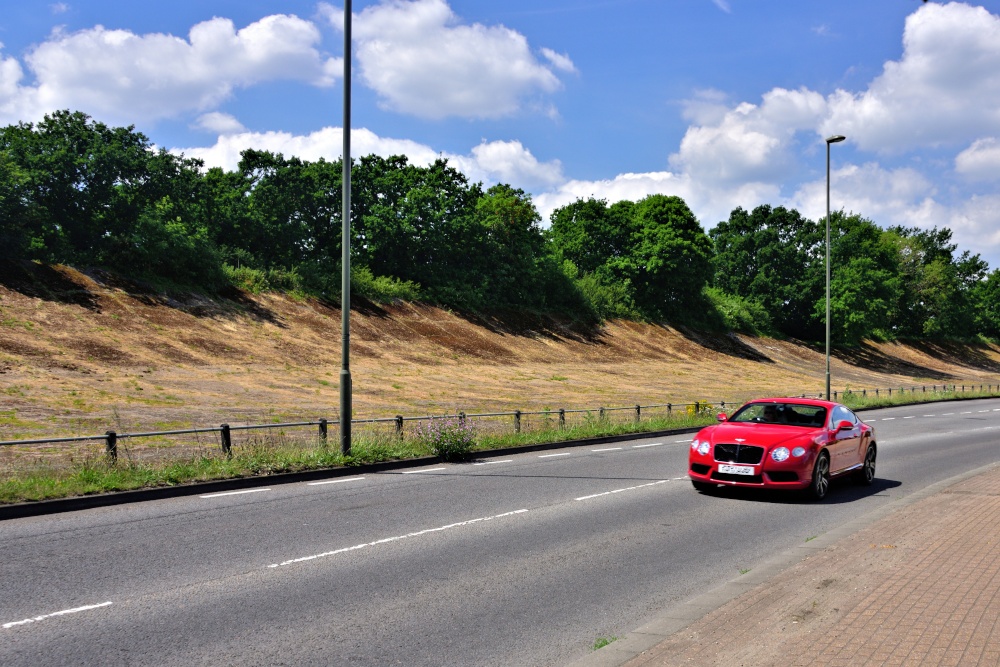 Bentley Continental GT Driving by the Old Brooklands Banking