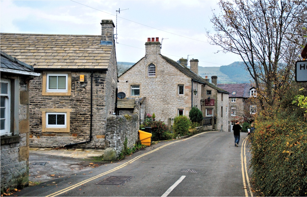 View Down Hollowford Road in Castleton, with Typical Stone Cottages & the Ramblers Rest pub