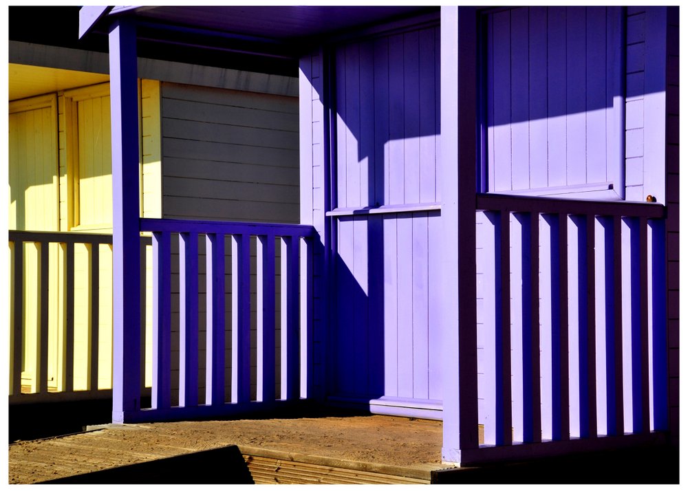 Photograph of Colourful beach huts