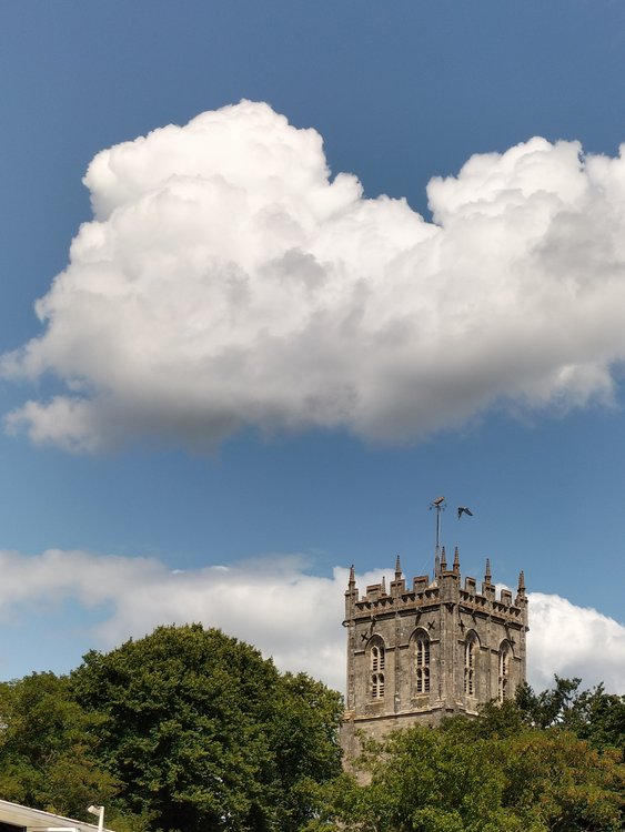 Pretty cloud over the Priory church in Christchurch