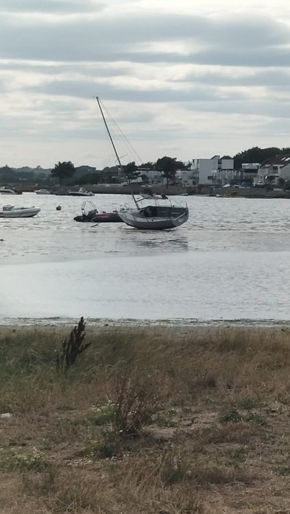 Boat at an angle in Christchurch harbour